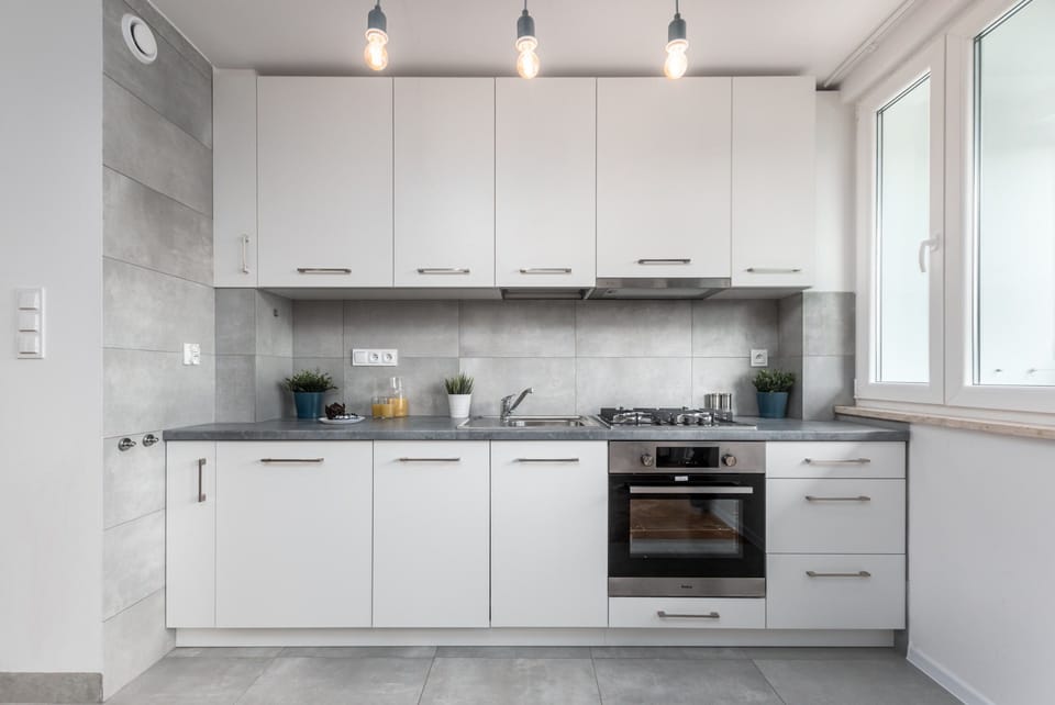 Fully equipped kitchenette with an electric  kettle, fridge freezer, gas cooktop, oven, dishwasher and toaster.