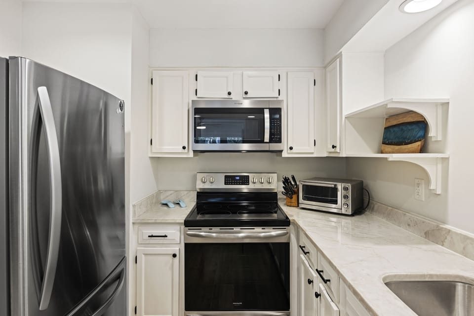 Beautifully upgraded kitchen with stainless appliances