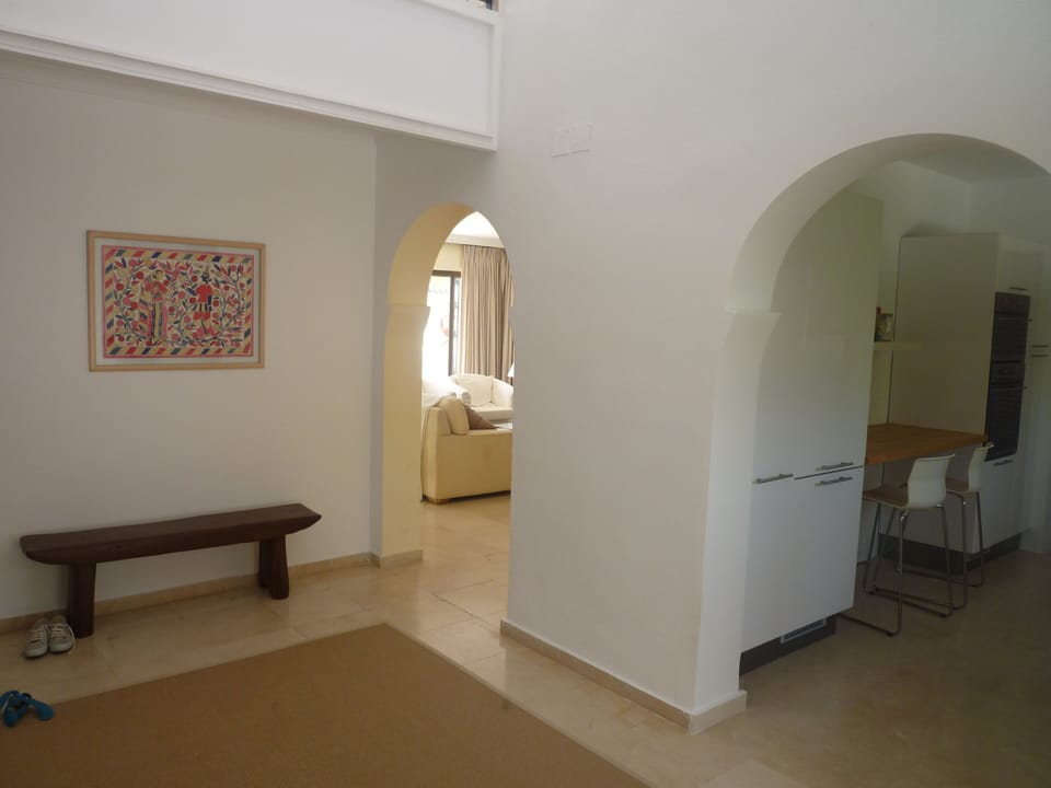 opposite side of the hall, access to kitchen and living room