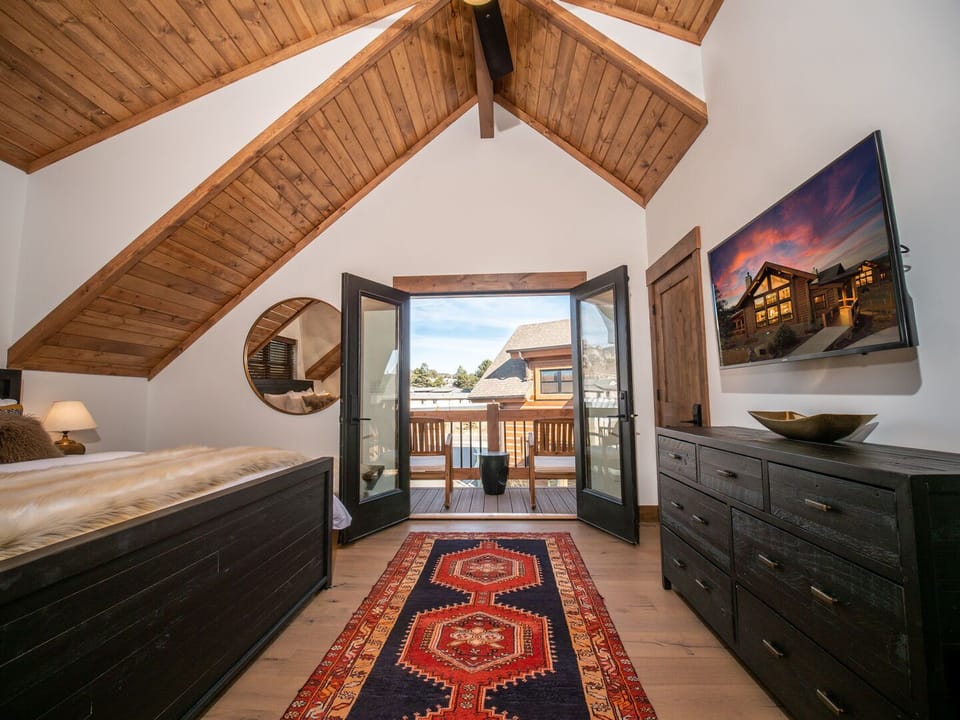 Upper level master bedroom with attached private bathroom