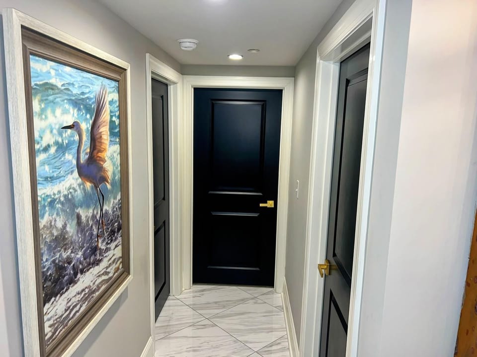 Bright hallway with modern art and sleek finishes