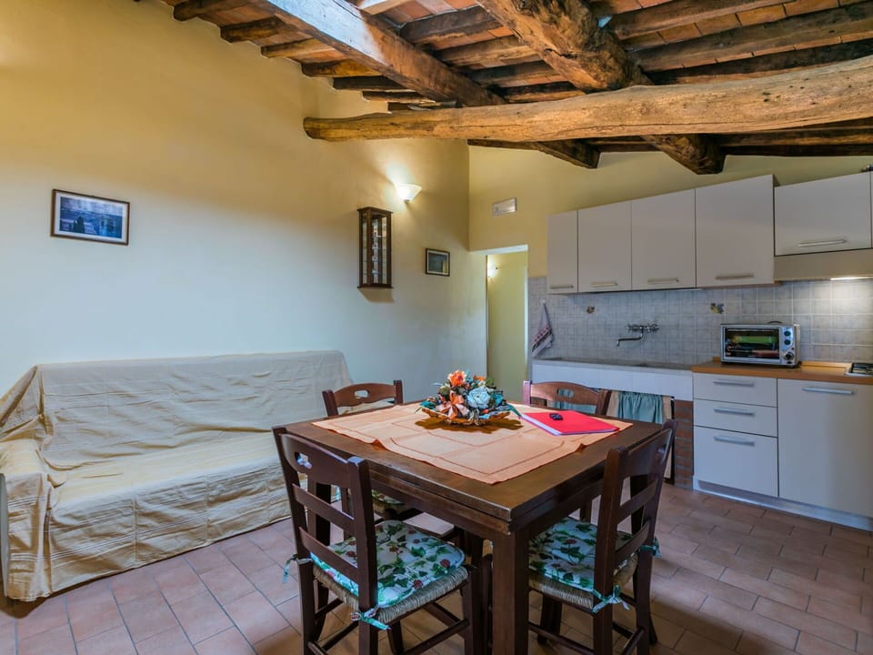 Furniture, Property, Table, Cabinetry, Countertop, Wood, Kitchen Appliance, Interior Design, Kitchen Stove, Lighting