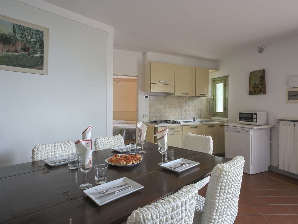 Table, Furniture, Cabinetry, Chair, Wood, Lighting, Interior Design, Flooring, Floor, Living Room