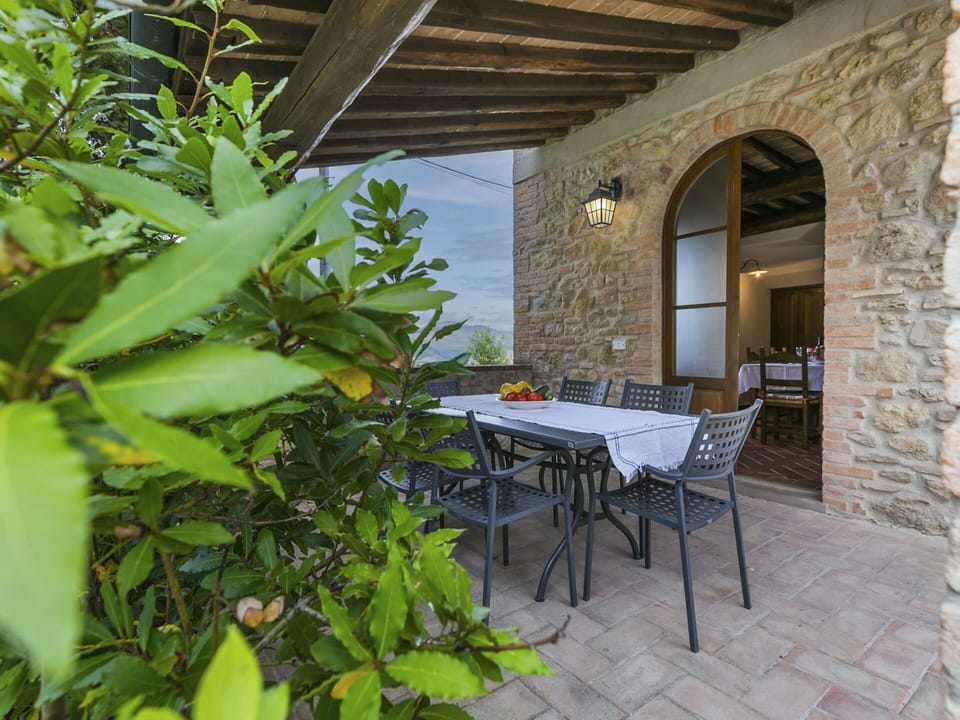 Plant, Property, Table, Building, Chair, Outdoor Table, Shade, Interior Design, Outdoor Furniture, Terrestrial Plant