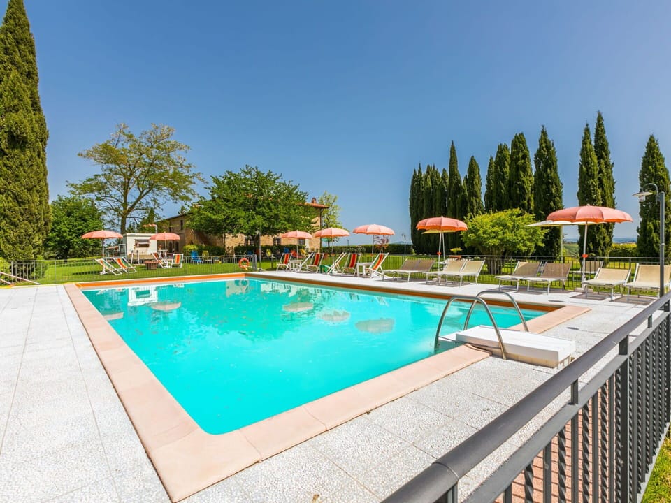 Water, Plant, Building, Sky, Property, Swimming Pool, Azure, Tree, Shade, Chair