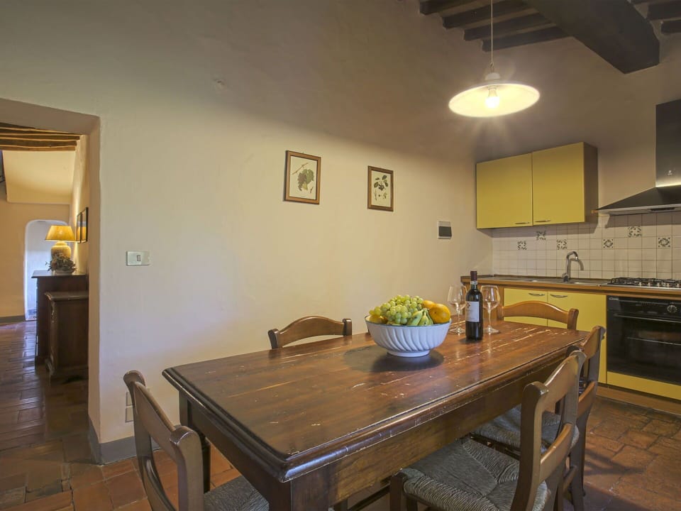 Property, Furniture, Table, Cabinetry, Countertop, Wood, Interior Design, Houseplant, Lighting, Plant