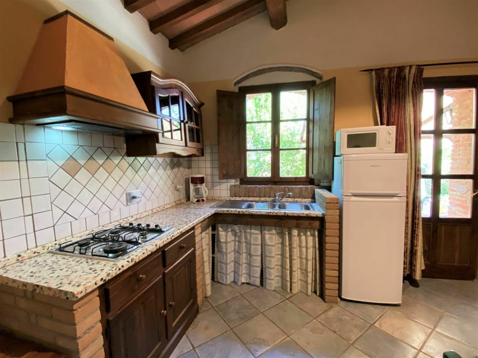 Countertop, Cabinetry, Property, Window, Kitchen, Kitchen Stove, Wood, Kitchen Appliance, Interior Design, Floor