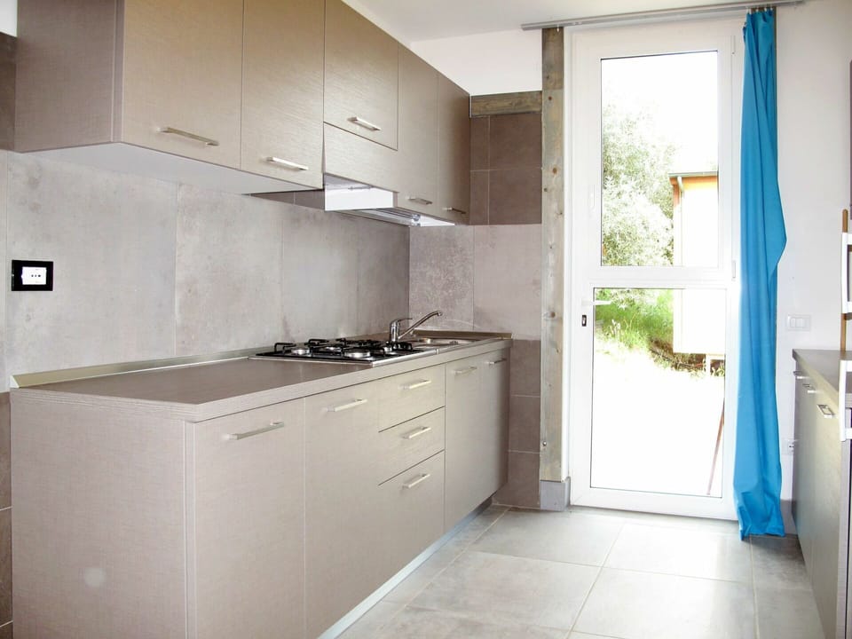 Cabinetry, Building, Countertop, Furniture, Kitchen Stove, Kitchen, Kitchen Appliance, Wood, Interior Design, Drawer