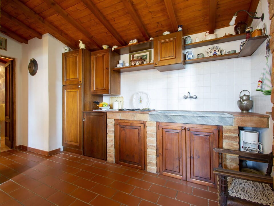 Brown, Cabinetry, Countertop, Wood, Kitchen, Interior Design, Floor, Flooring, Sink, Wood Stain