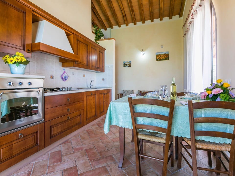 Cabinetry, Furniture, Property, Countertop, Flower, Table, Plant, Houseplant, Chair, Building