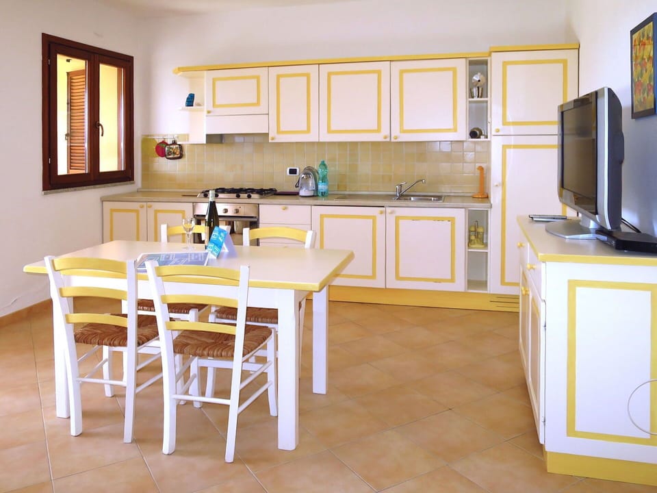 Cabinetry, Furniture, Countertop, Table, Picture Frame, Wood, Kitchen Appliance, Interior Design, Flooring, Floor