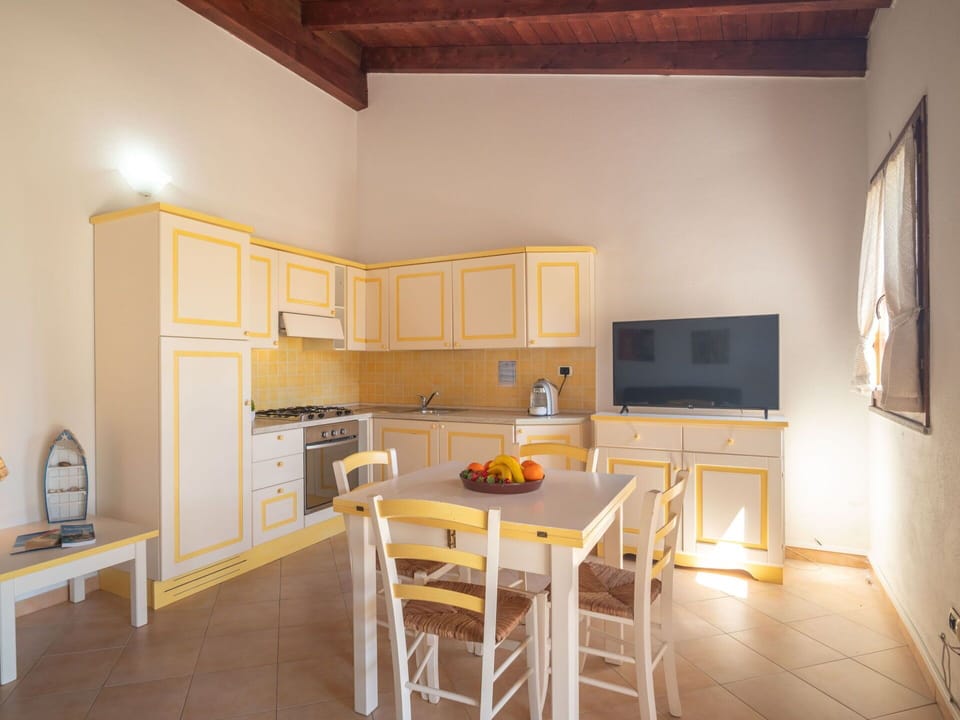 Property, Furniture, Table, Wood, Cabinetry, Interior Design, Flooring, Floor, Chair, Living Room