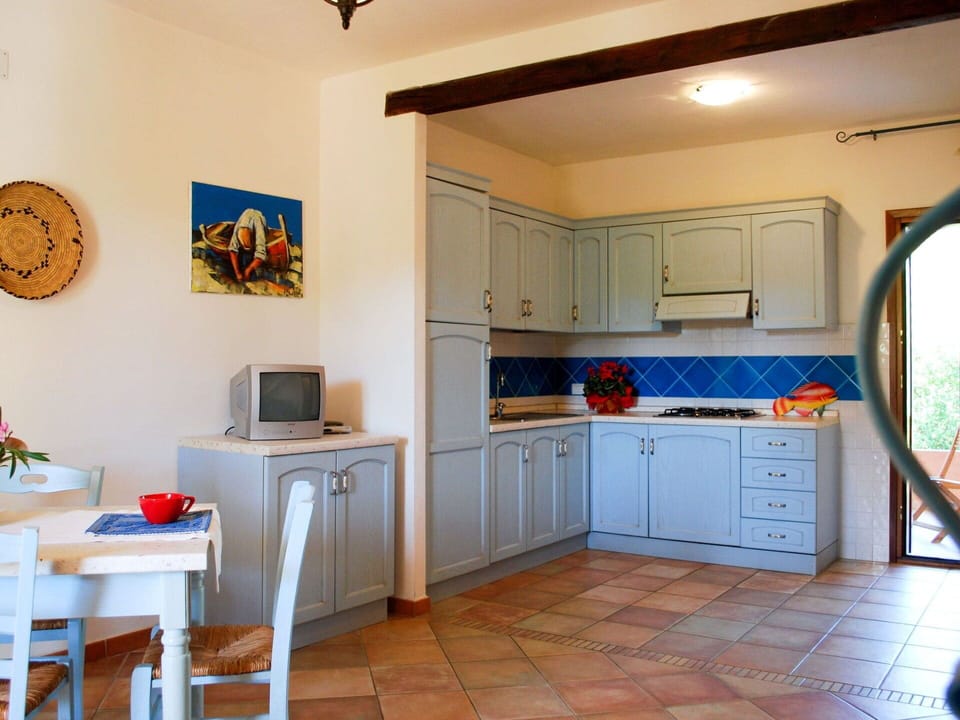 Cabinetry, Furniture, Property, Countertop, Building, Drawer, Azure, Lighting, Interior Design, Kitchen
