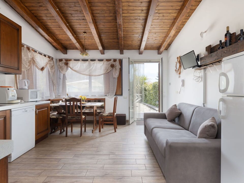 Property, Furniture, Couch, Building, Table, Window, Wood, Interior Design, Cabinetry, Chair
