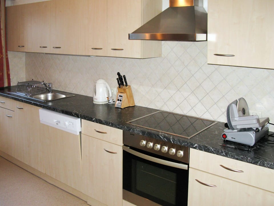 Countertop, Kitchen, Property, Room, Cabinetry, Kitchen Stove, Furniture, Gas Stove, Major Appliance, Kitchen Appliance