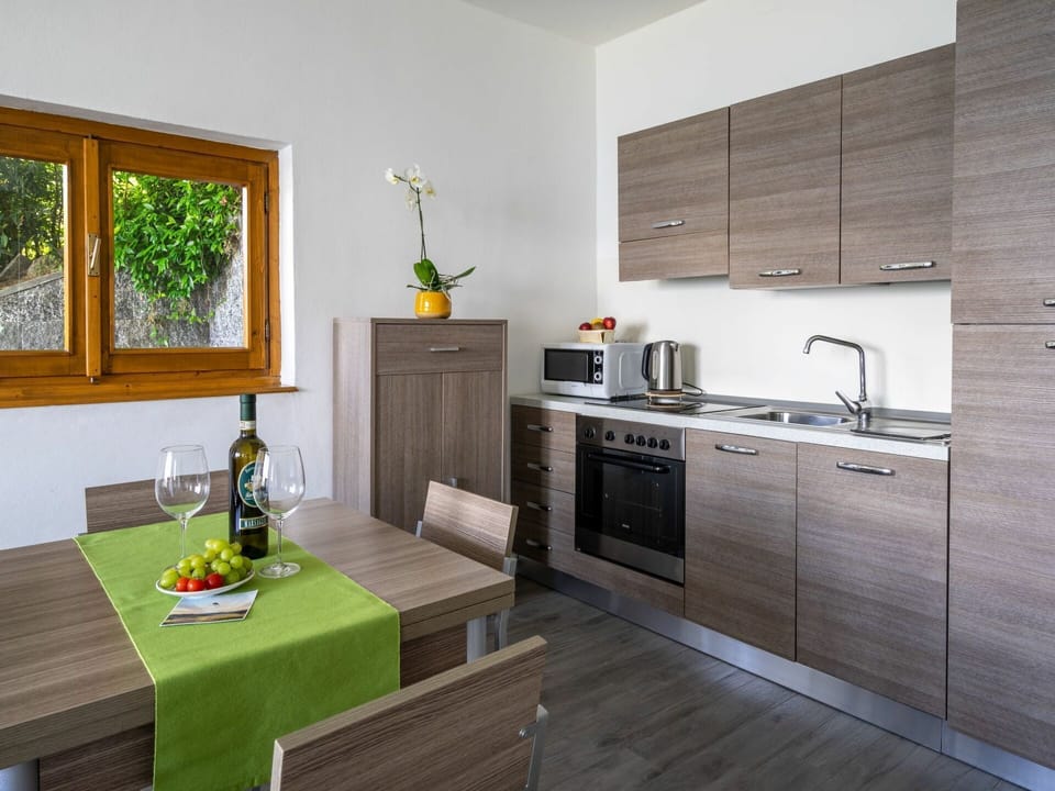 Room, Furniture, Property, Kitchen, Countertop, Cabinetry, Interior Design, Building, House, Floor