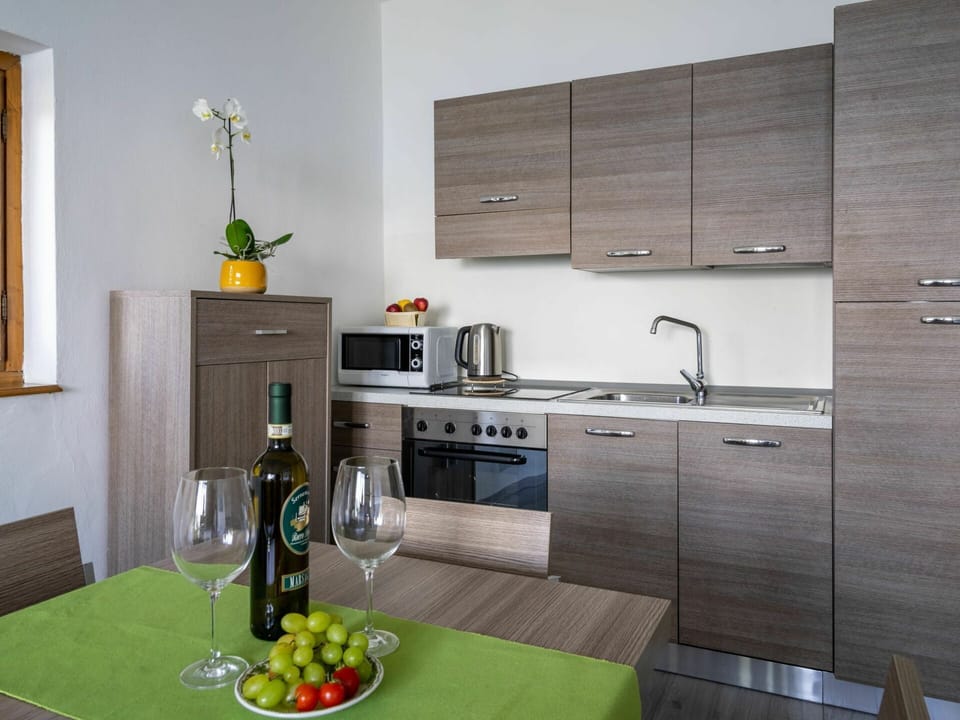 Countertop, Room, Kitchen, Property, Cabinetry, Furniture, Tile, Interior Design, House, Sink