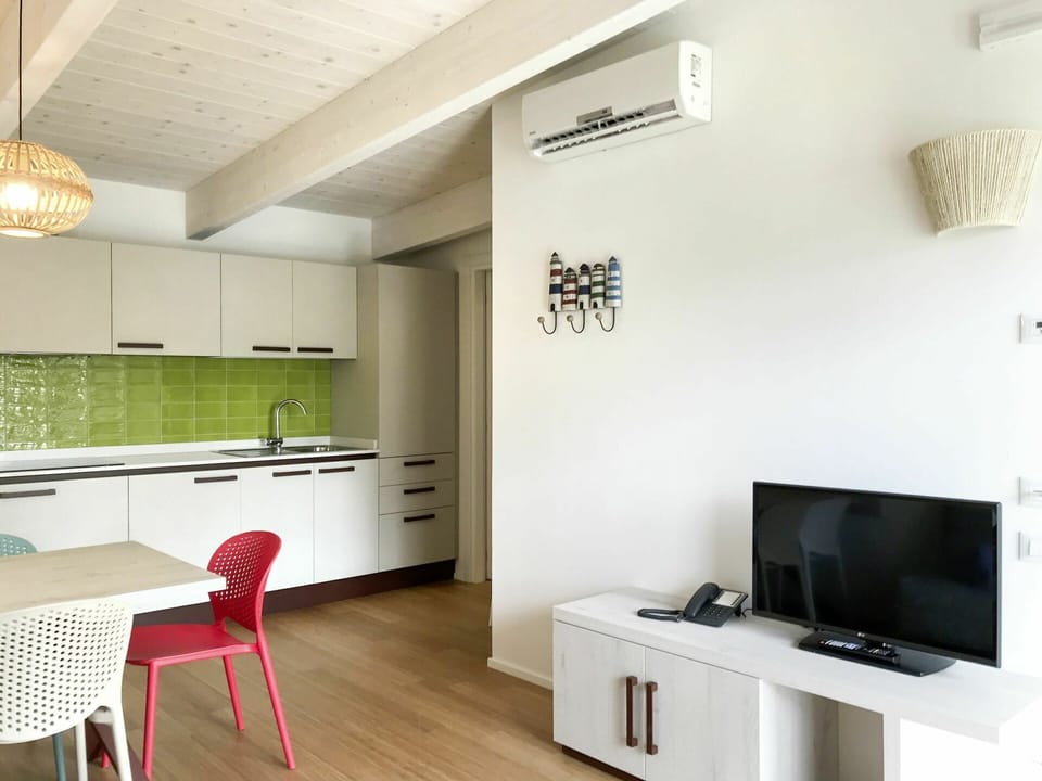 Furniture, Property, Table, Cabinetry, Countertop, Interior Design, Wood, Building, Lighting, Floor