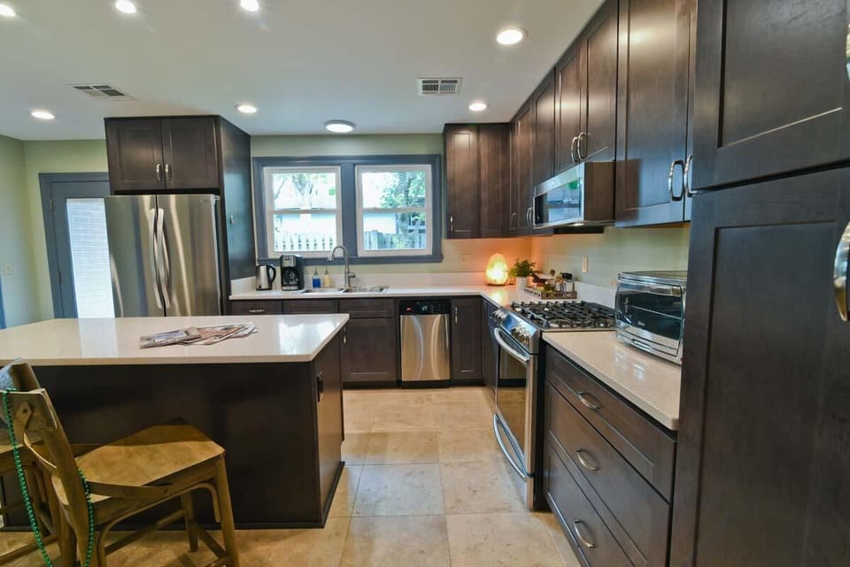 Sink overlooks garden with fruit trees