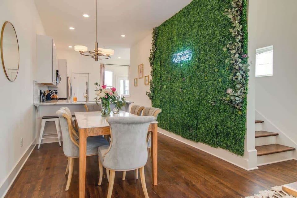 Come together with your guests for meals in our welcoming dining room, complete with a beautiful photo wall.