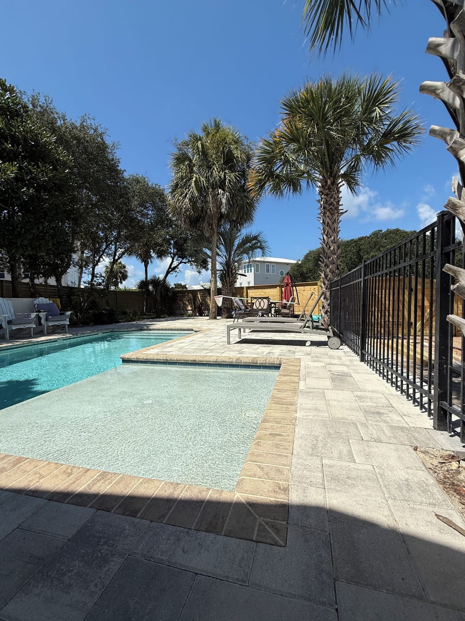 Large private pool area with grill and seating