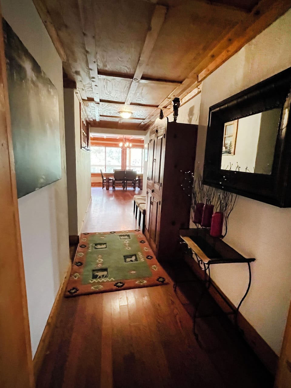 hallway from kitchen to living area and bedrooms