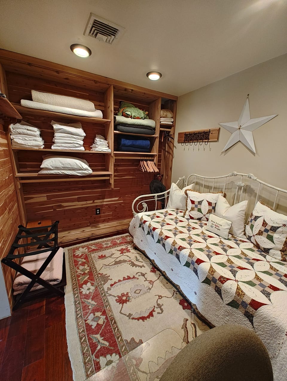Master bedroom walk-in with trundle bed and desk