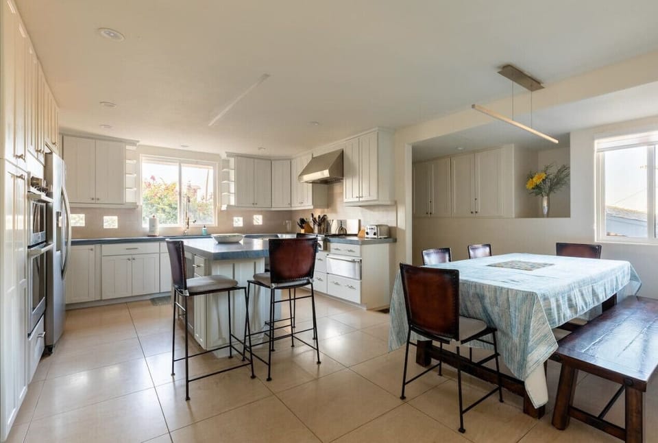 Fully stocked kitchen with state of the art appliances. Ample room for seating.