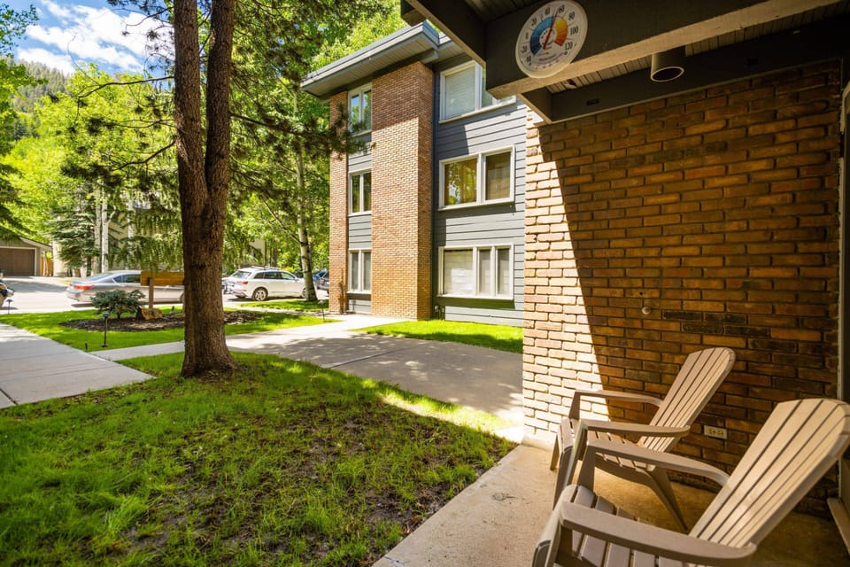 Relax on the patio with a beverage and enjoy the cool shade and quiet residential neighborhood.