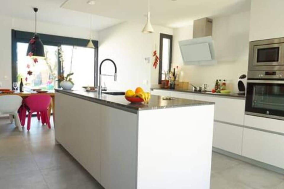 Villa Puerto Blanco Luxury Vacation Rental - Kitchen diner overlooking the pool