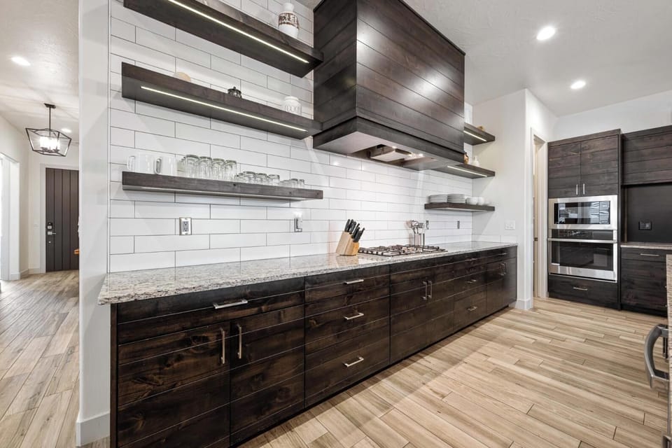 Kitchen is stocked with appliances and utensils