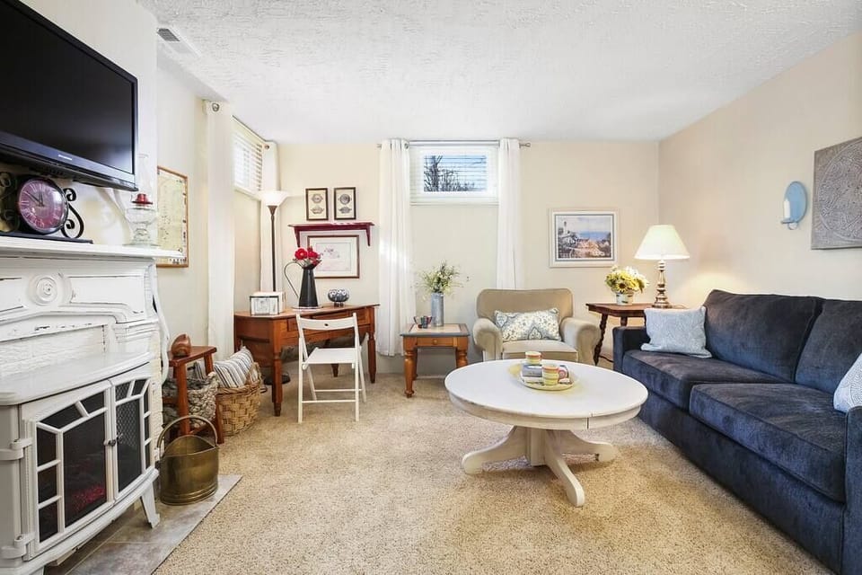 The spacious living room has plenty of comfortable seating!