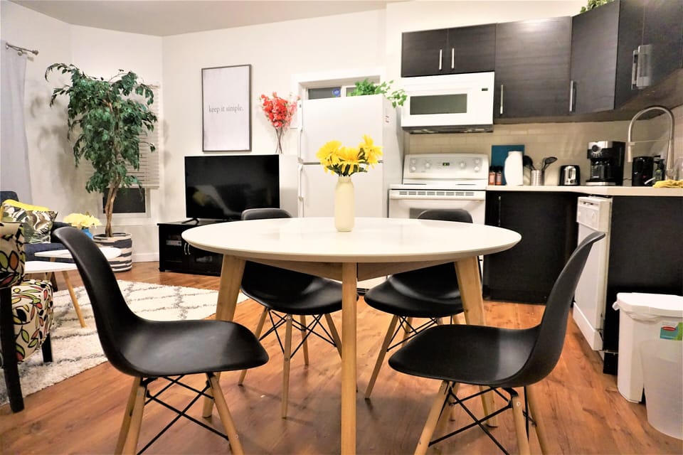 enjoy having dinner at modern slick dining table