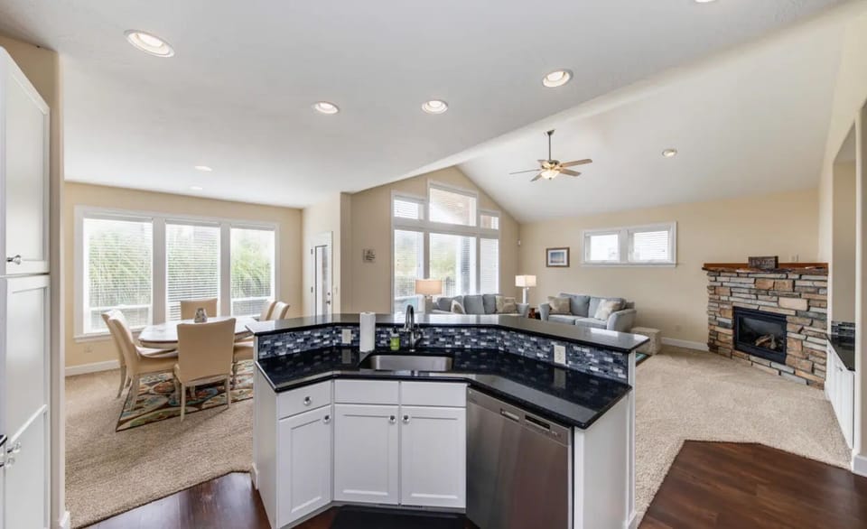 We have an open living, kitchen, and dining area, perfect for entertaining. 