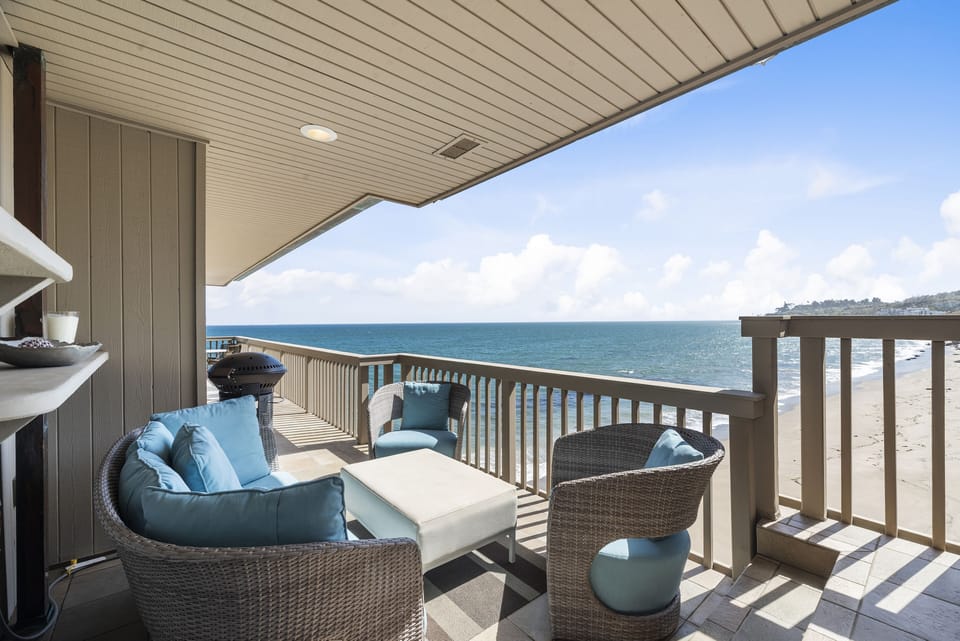 Private deck connected to unit. Sliding glass doors off living room and master. 