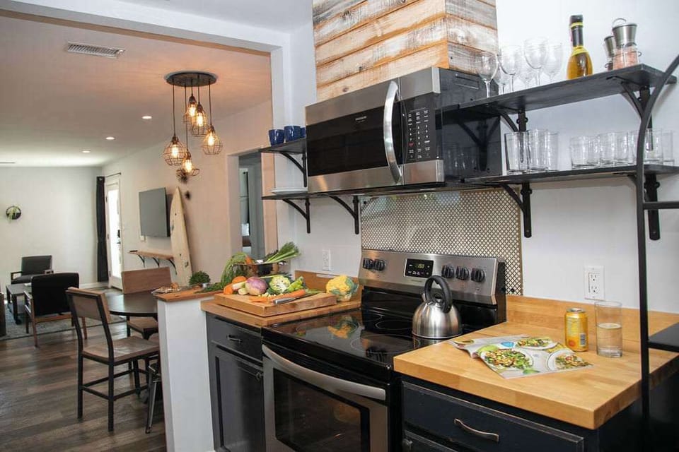 22.  Galley Kitchen Open to the Main Area Allows Guests to Remain Engaged