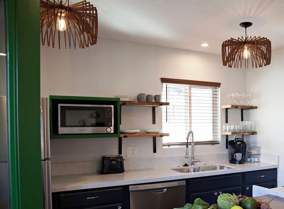 16. Well Appointed Kitchen with Full-Size Stainless Steel Appliances.