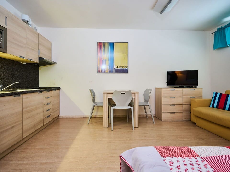 Furniture, Interior Design, Flooring, Floor, Room, Wood, Ceiling, Textile, Lighting, Table