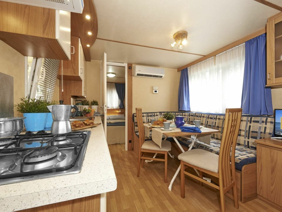 Table, Furniture, Chair, Building, Kitchen Appliance, Curtain, Architecture, Plant, Countertop, Houseplant