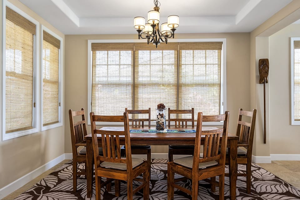 The cozy dining area at Kona Blue Vacations Holua Kai is ideal for card games, dinner, or morning coffee.