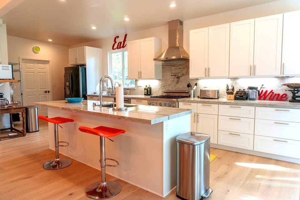 Kitchen island-Chef's kitchen open to dining/living great room garden views