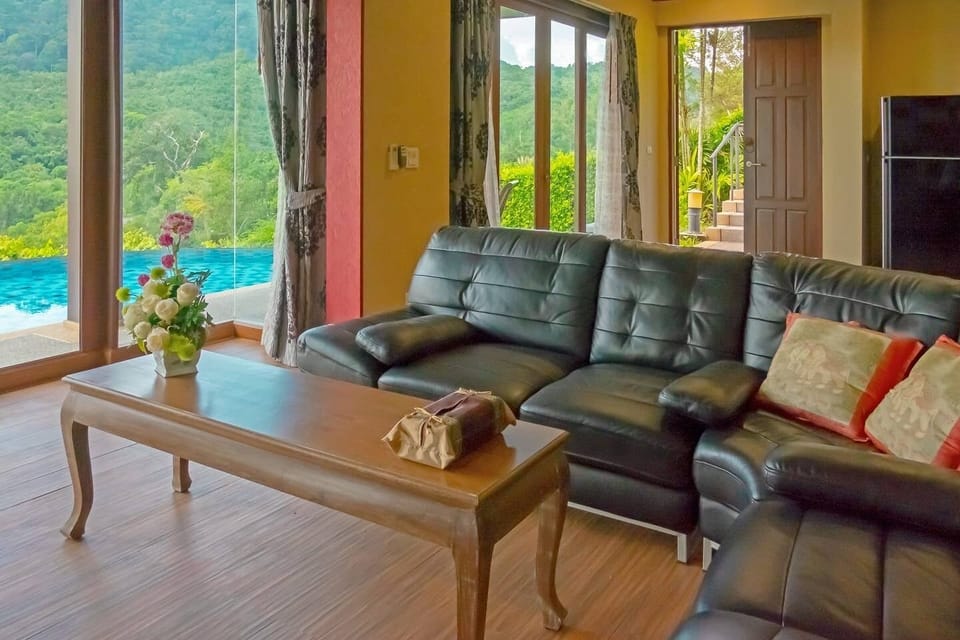 Big poolside living room with cable TV