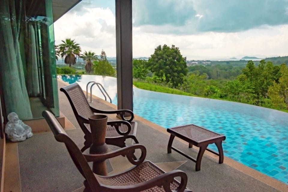 Sunbathing area at pool side, with uncomparable ocean view. Hilltop in Phuket