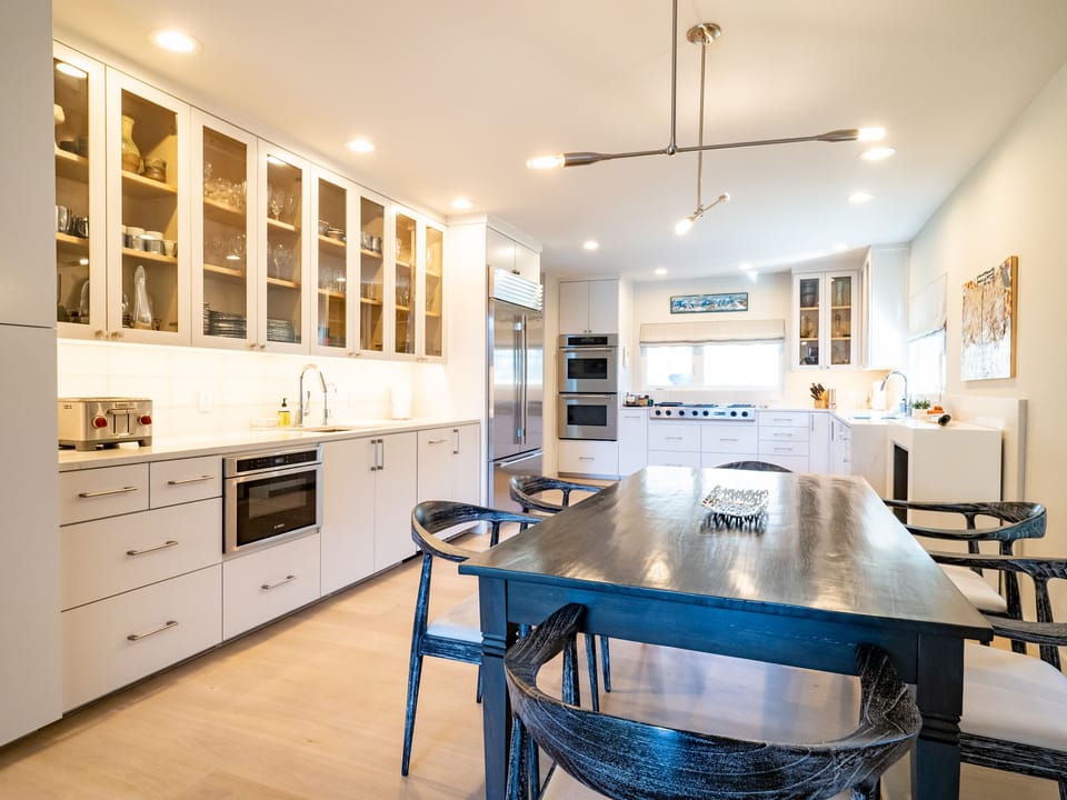 Kitchen dining table with option to extend for seating up 12 guest