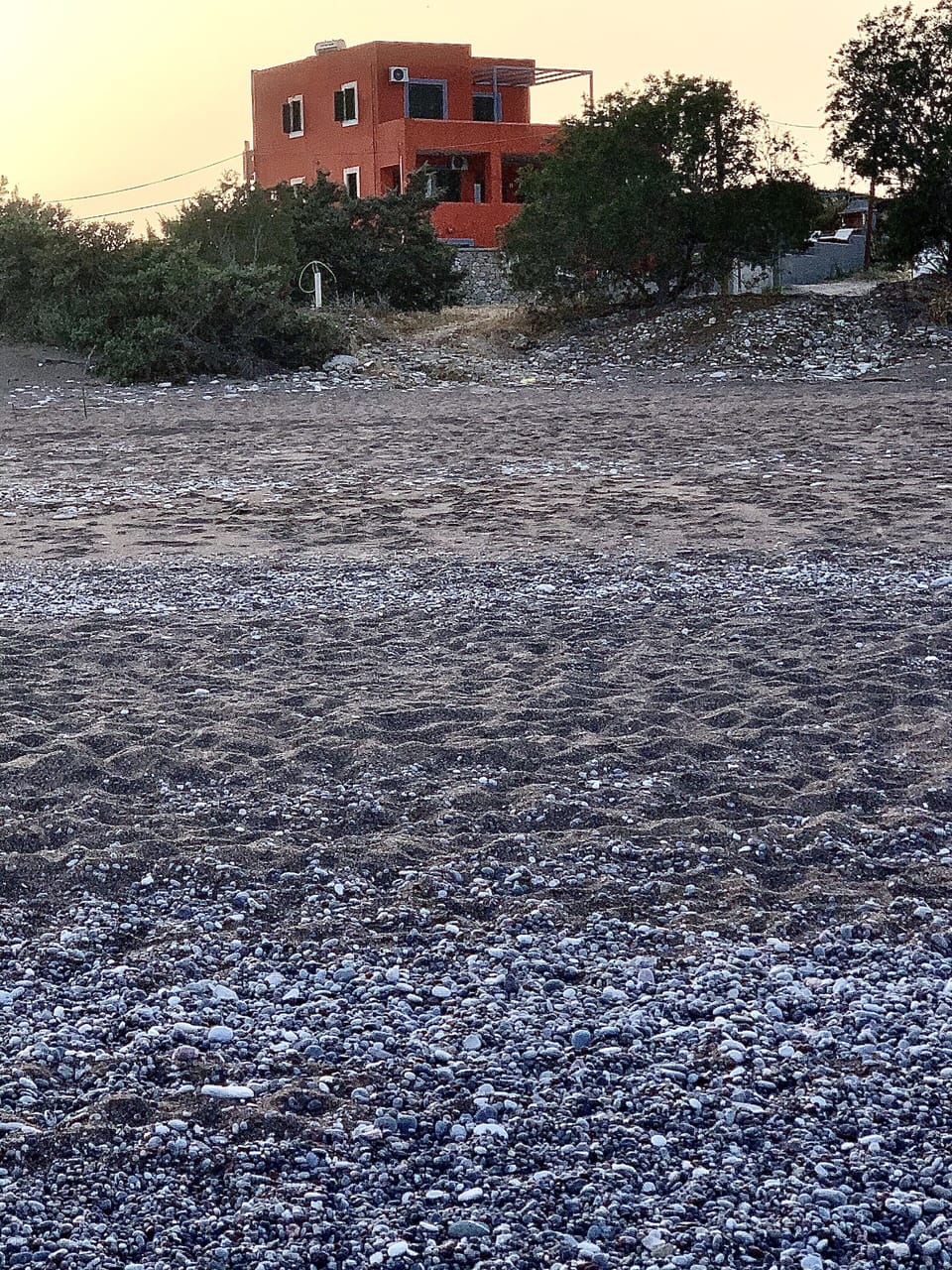 The building is on the beach 