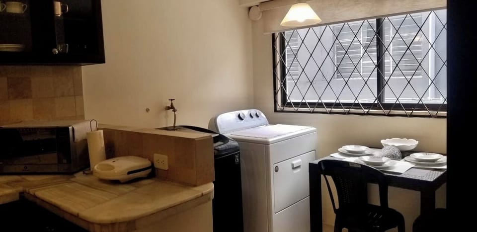 Washer and Dryer, kitchen area with breakfast table 