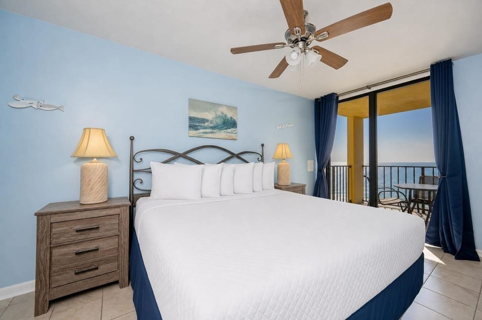 Relax on the king bed in the master while the quiet hum of the ceiling fan soothes you before beachside dreams