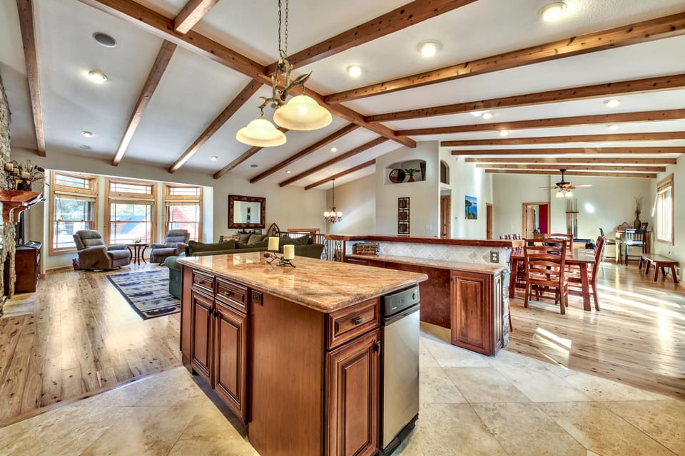This open floor plan was definitely designed with socializing in - This open floor plan was definitely designed with socializing in mind! From the farthest corner of the kitchen you can see the living space, dining area, and pool table