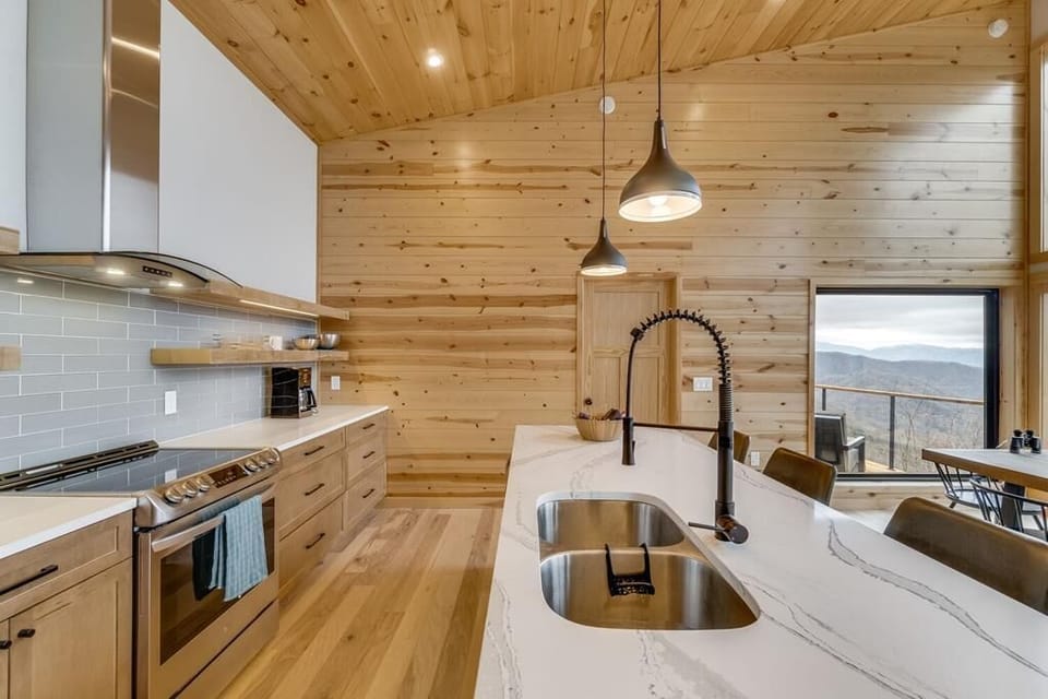 kitchen with master bedroom door in distance