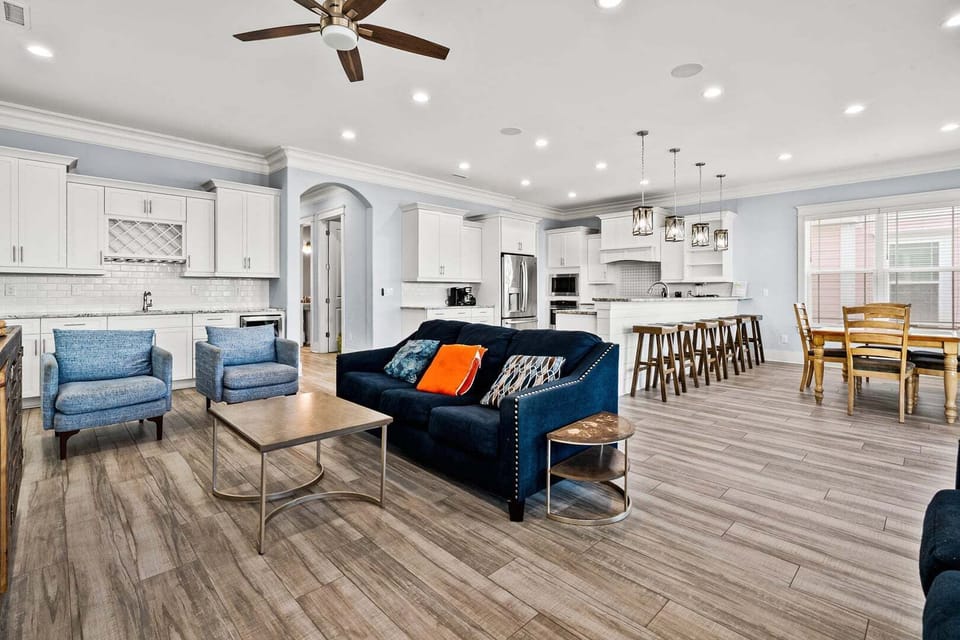 Open living and kitchen space with bar seating at Ocean Current in Cherry Grove, North Myrtle Beach